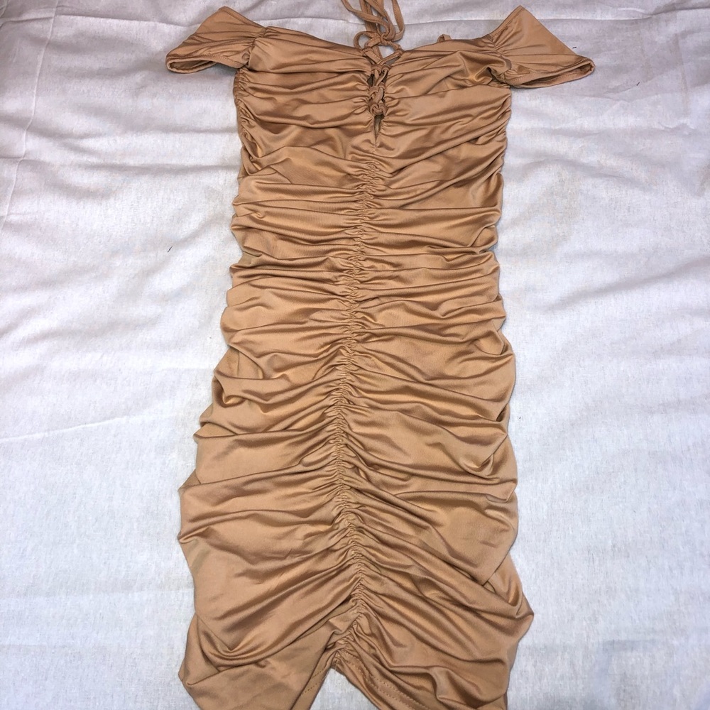 Lace up woman’s off shoulder dress